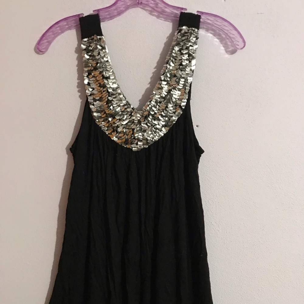 Tank with sequins on neckline. Size L